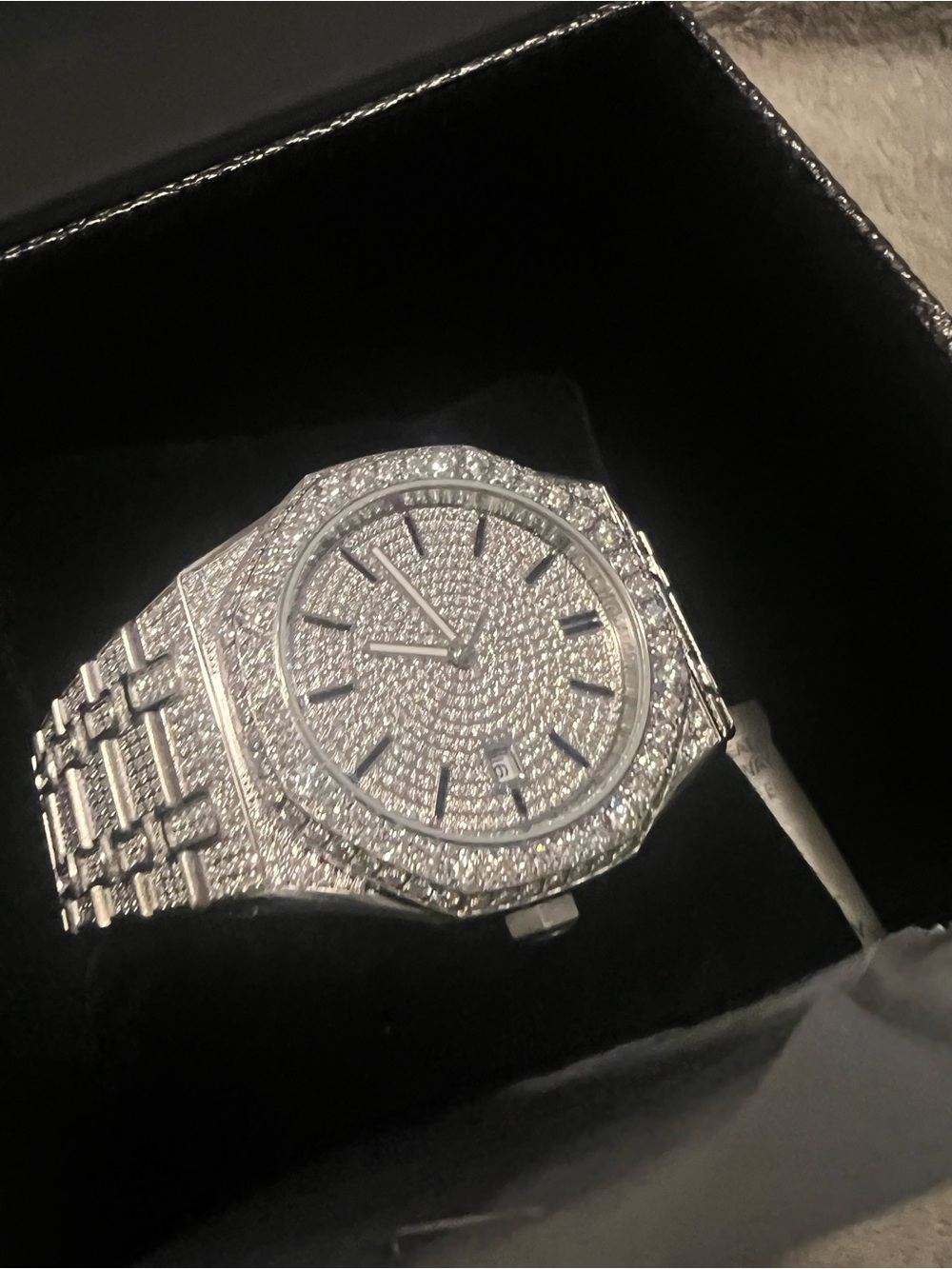 Fully iced-out men’s watch featuring sparkling lab-made diamonds,